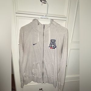 Nike. University of Arizona tan zip up jacket. Size: medium